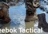 person walking through muddy water wearing tactical boots and camo pants