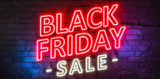 Black Friday 2024 is Here! Red neon sign that says black friday sale