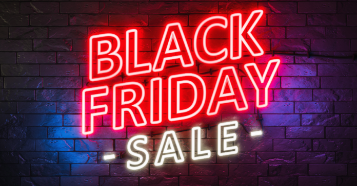 Red neon sign that says black friday sale